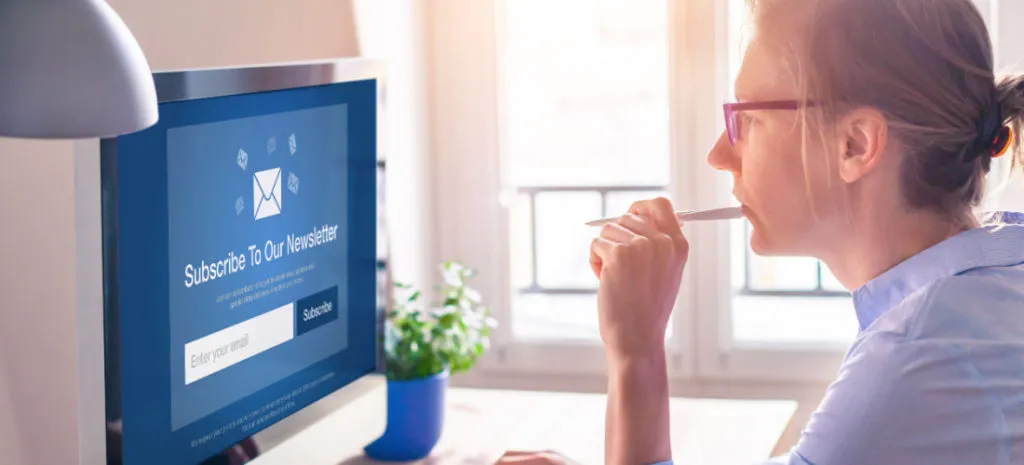 woman looking at computer screen