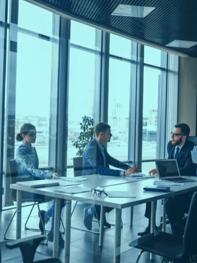 Business people around a conference table